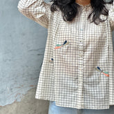 Ivory black windowpane check top with dragonfly motif embroidery